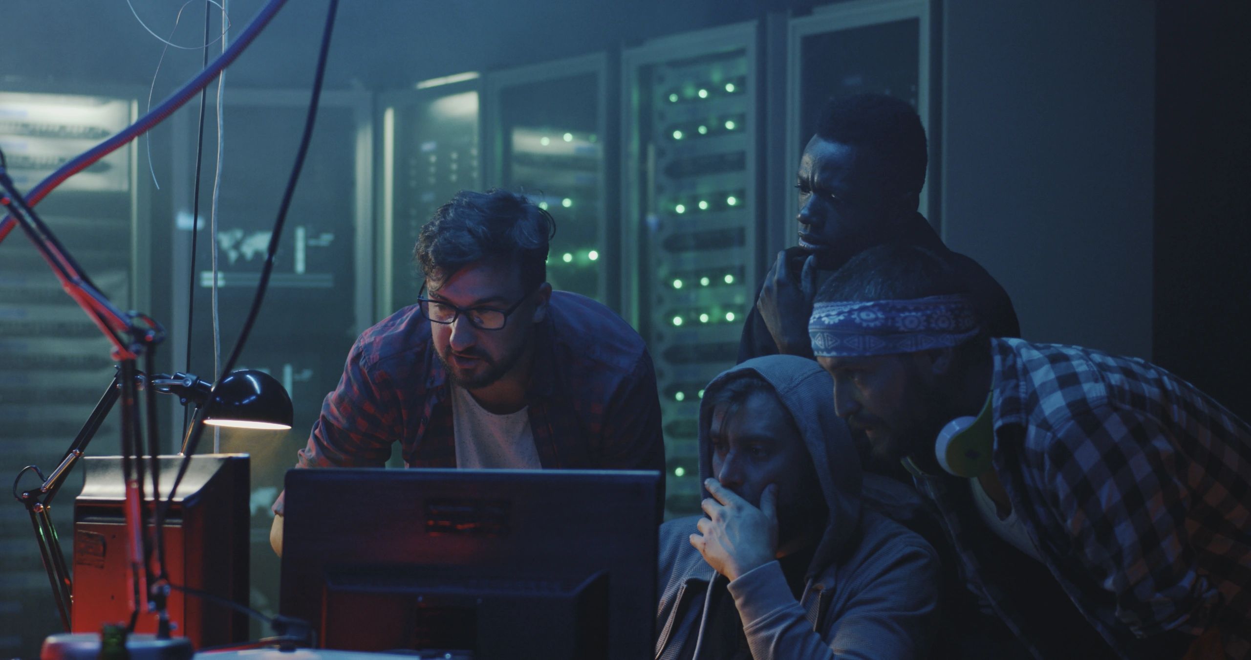 Security professionals monitoring systems